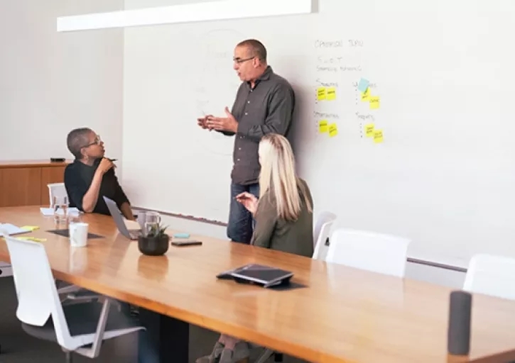 man at whiteboard